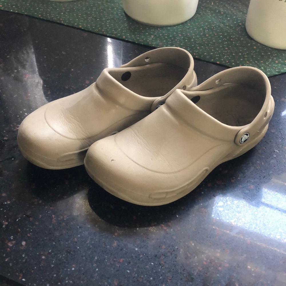 Women’s size 8 or Men’s size 6 Tan Crocs